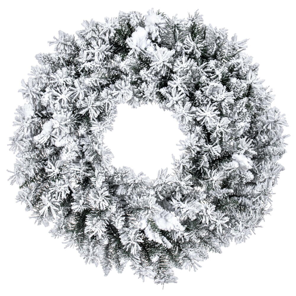 Representative snow-flocked Christmas wreath on a white background